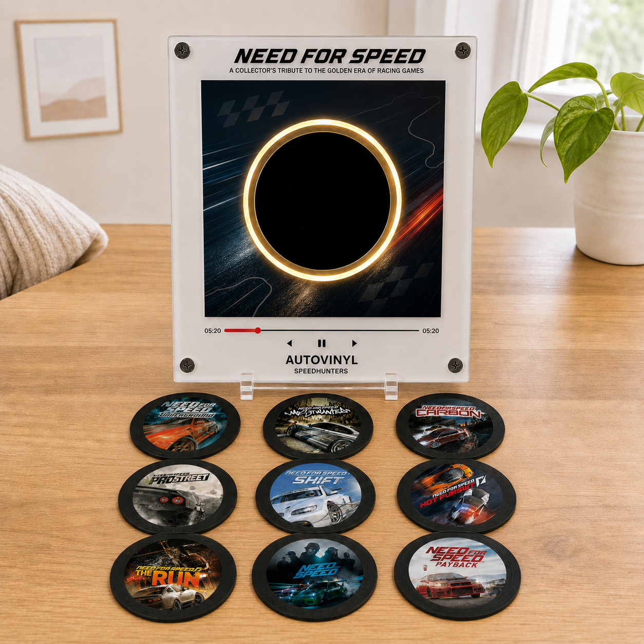 NFS Vinyl player on a desk with the nine discs laid out